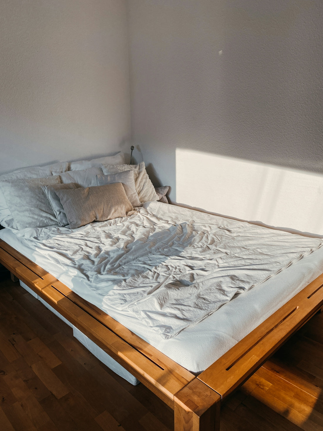 white and gray bed linen